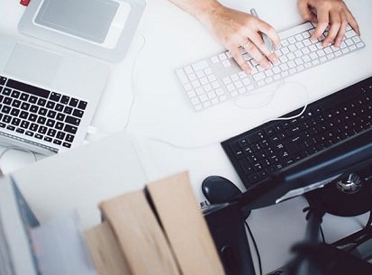 002316 Person on Black and Gray Keyboard Free Stock Photo